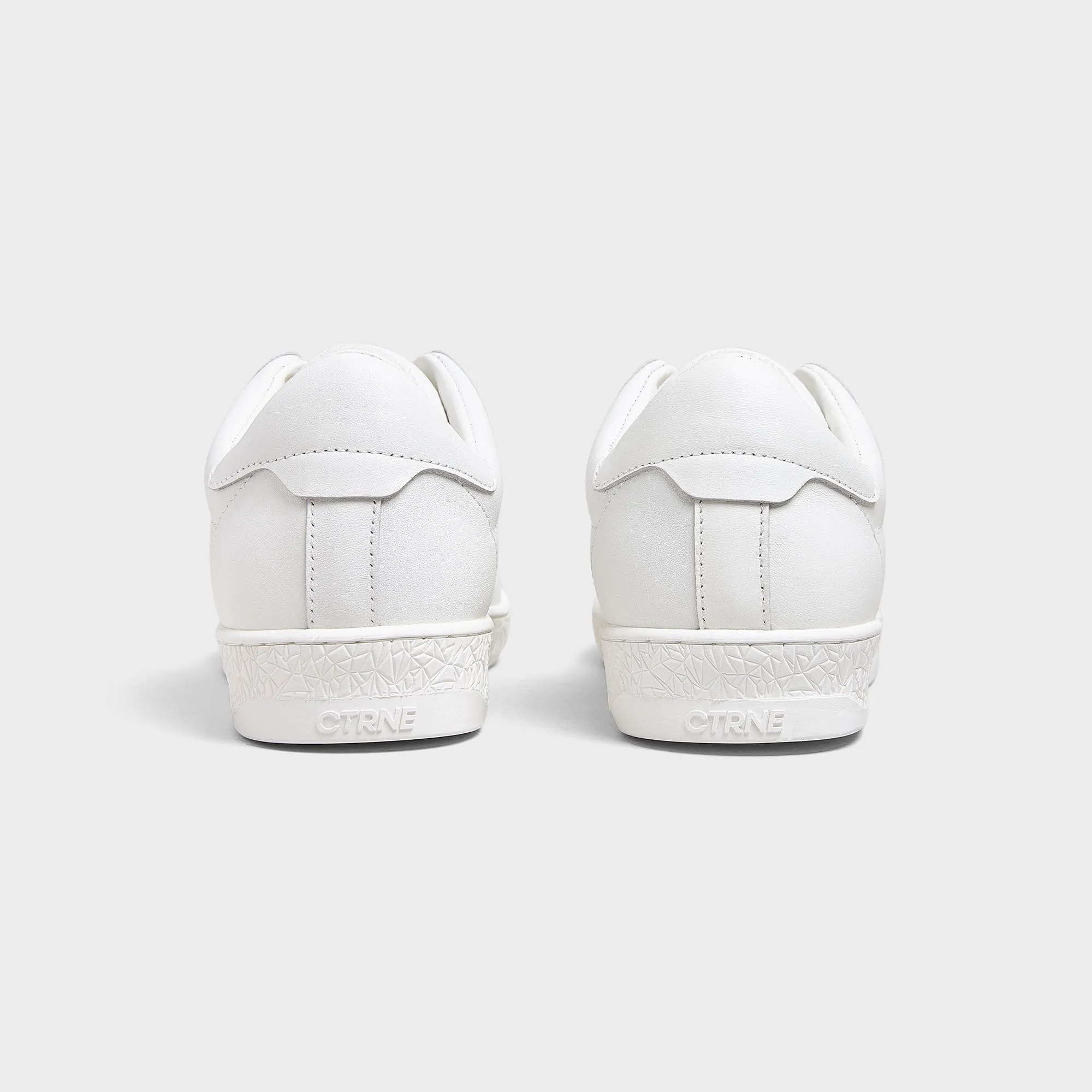 Geode Manifest Sneaker in White/Leather
