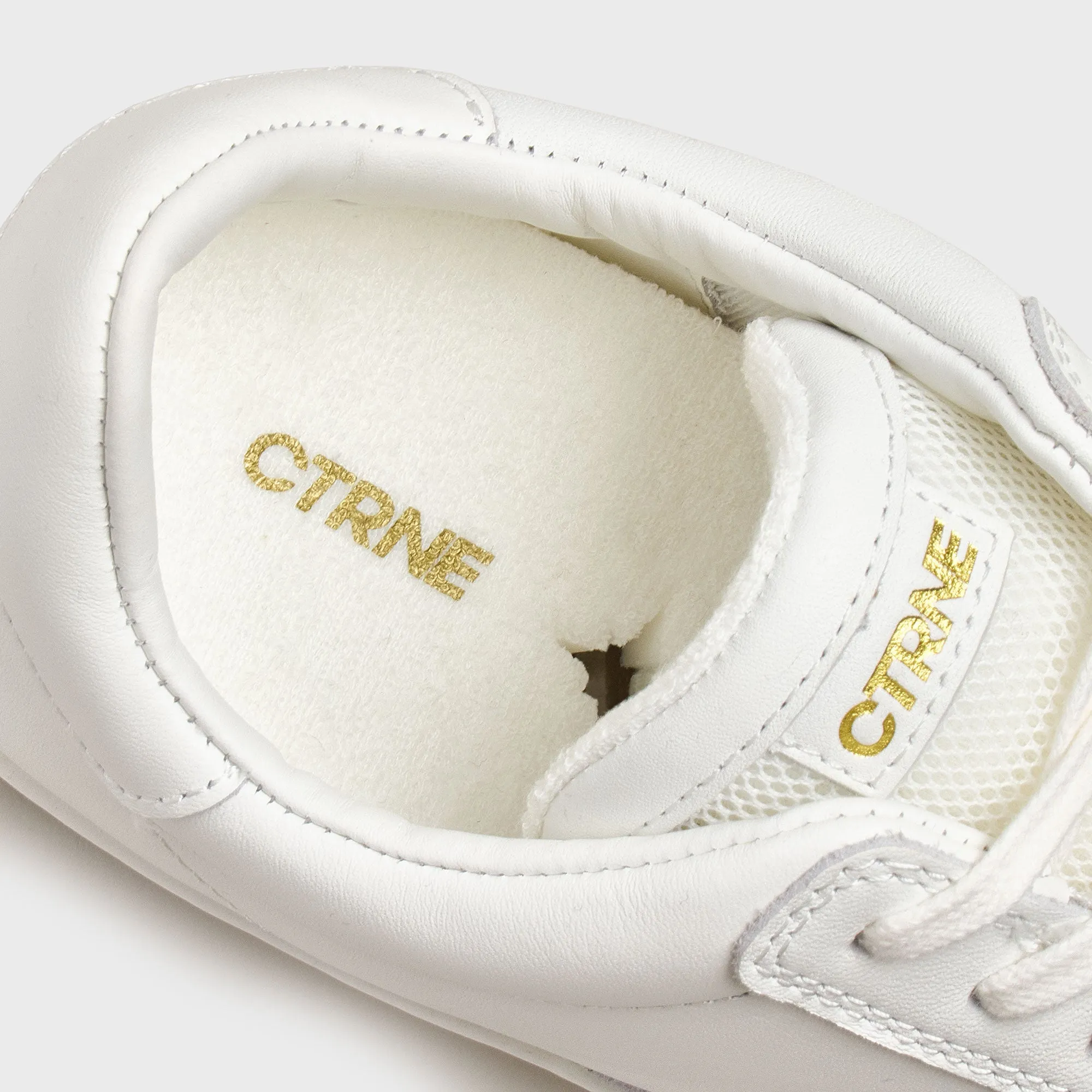 Geode Manifest Sneaker in White/Leather
